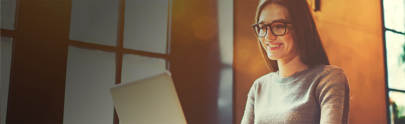 Lady working at a desk.